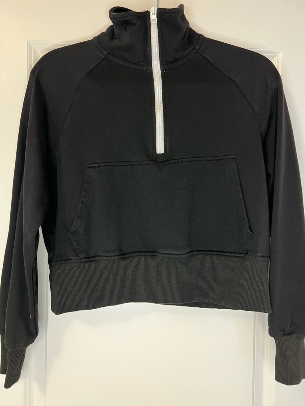 Women black cropped half zip sweater with pocket
